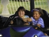 Sisters (9 & 7 years old) riding in bumber cars at Stanly County Fair, North Carolina. (MR)