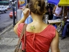 On the street in San Jose, Costa Rica. Turtle tatoo.
