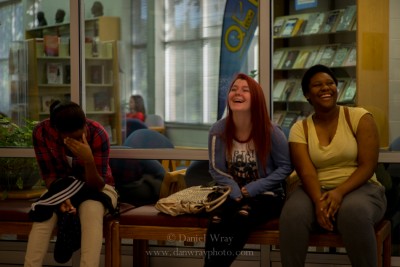 Three college girls laughing.